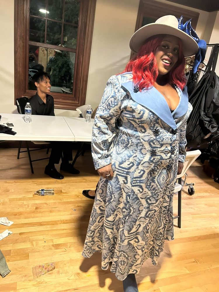 Silver paisley coat with denim collar and blue hat
