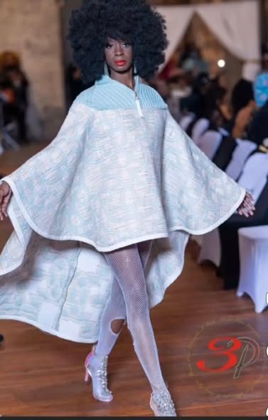 Made to Fit white sculpted cape and skirt on the runway