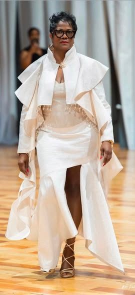 White ruffle jacket and skirt on the runway